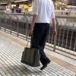 man carrying ramp in small briefcase size bag